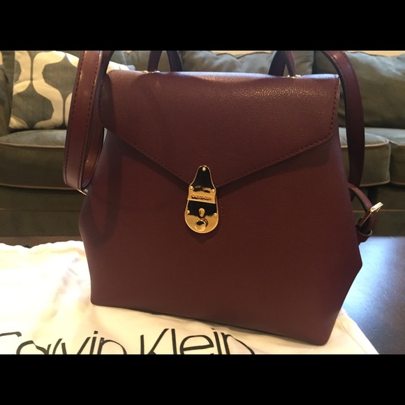 Calvin Klein Handbags - Calvin Klein Lock leather backpack 🎒
